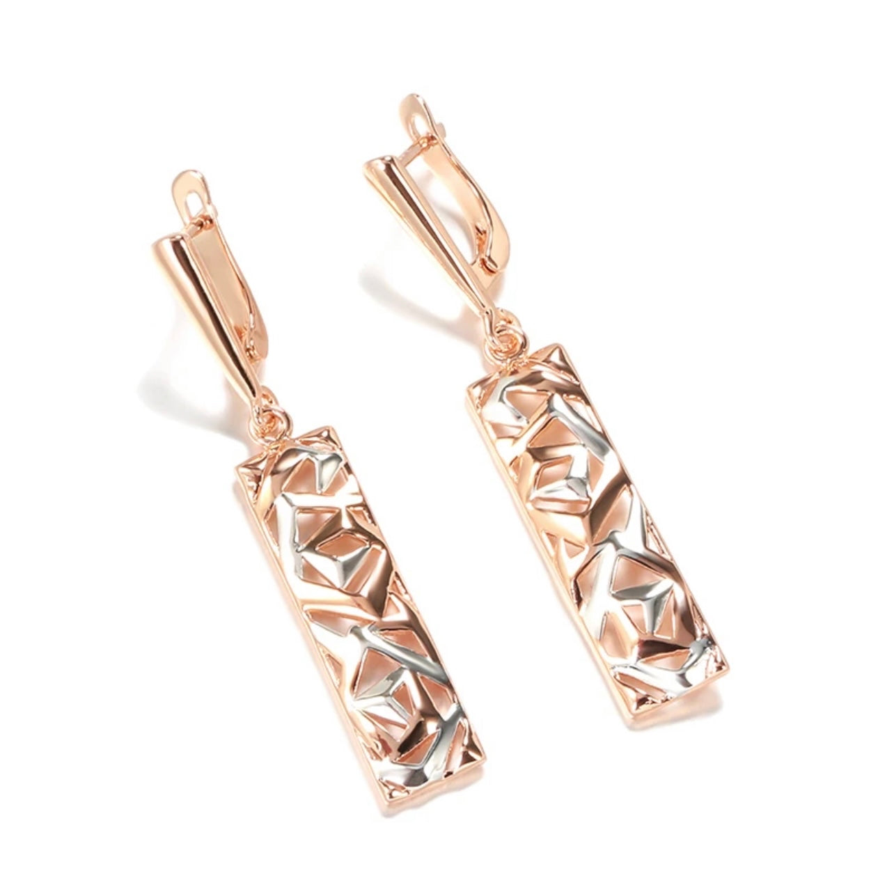 This Sterling Silver, Rose Gold, and High-grade Steel tricolor necklace and earrings set is perfect for any special woman in your life. Crafted with expertly sourced top-grade steel and silver material, these pieces are timeless and sure to make a lasting impression. The pendant is a twisted-rectangle shape adorned with dazzling sparkles, while the 18-inch link-style necklace complements with a bold yet elegant look. Matching tricolor earrings complete the set - perfect for any occasion!