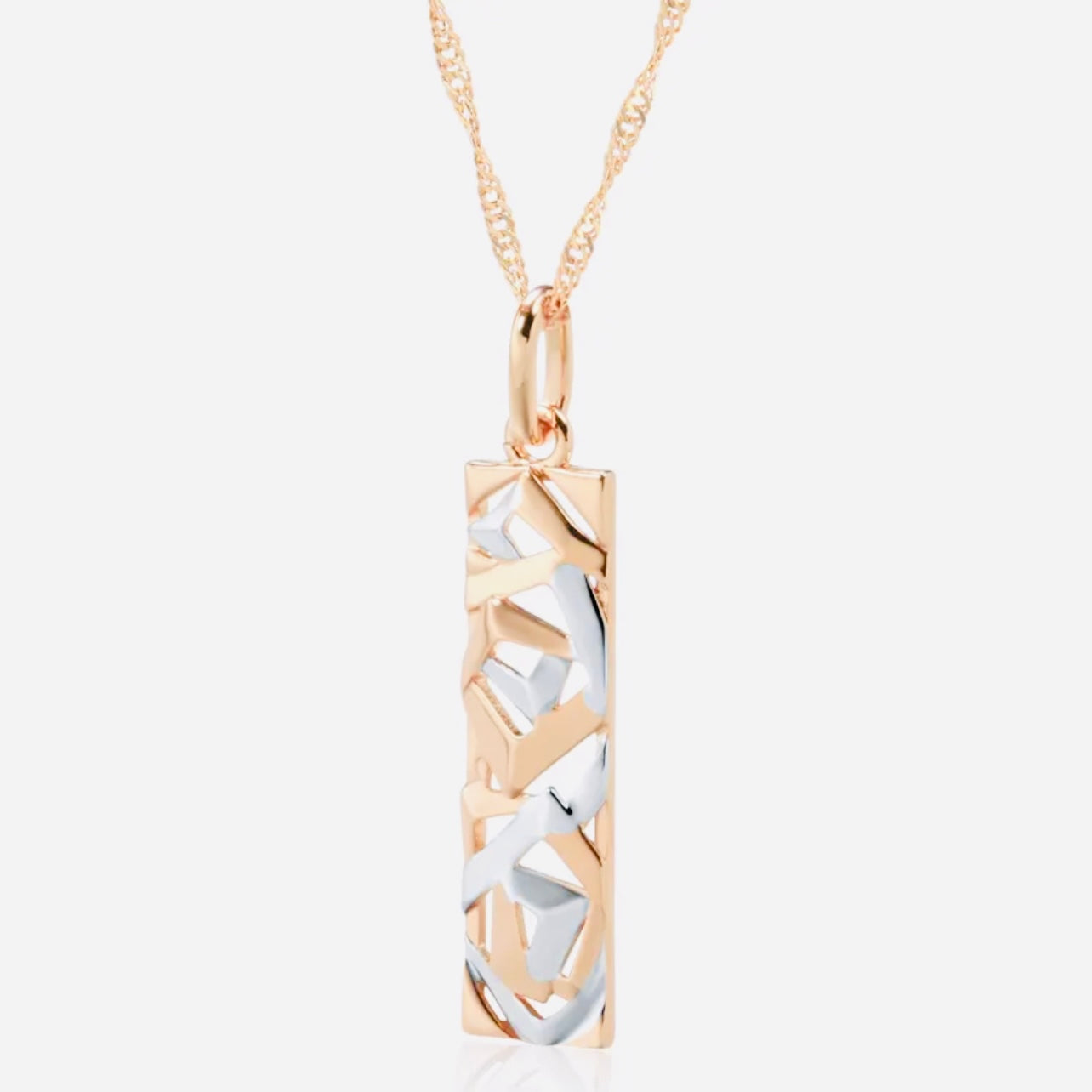 This Sterling Silver, Rose Gold, and High-grade Steel tricolor necklace and earrings set is perfect for any special woman in your life. Crafted with expertly sourced top-grade steel and silver material, these pieces are timeless and sure to make a lasting impression. The pendant is a twisted-rectangle shape adorned with dazzling sparkles, while the 18-inch link-style necklace complements with a bold yet elegant look. Matching tricolor earrings complete the set - perfect for any occasion!