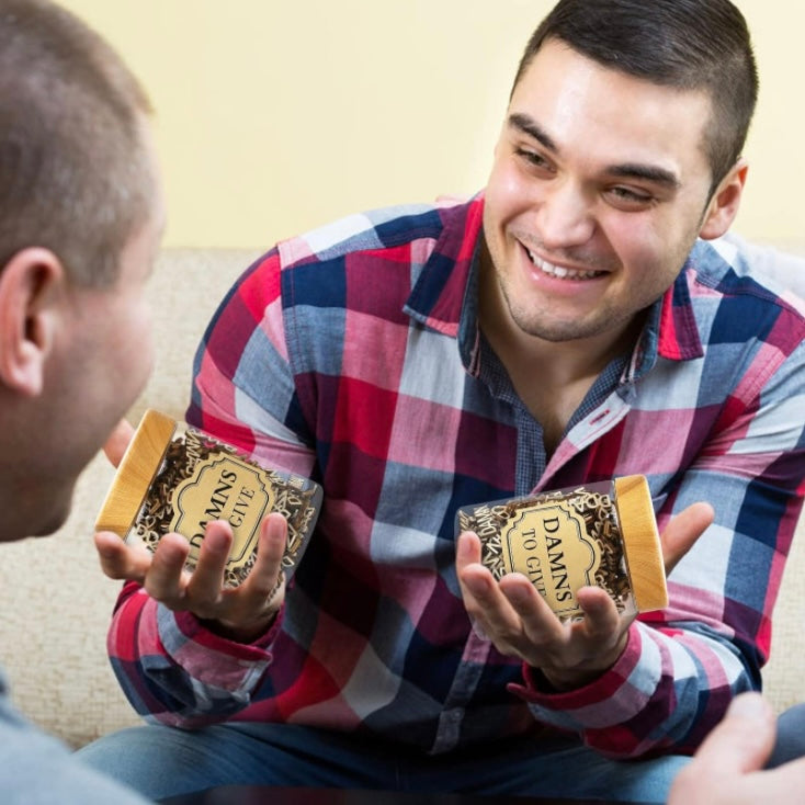 Funny Gag Gifts - Glass jars featuring and filled with individual wooden curse words that say Damns, F*cks or Hugs w/ sticker on the jar that states “damns to give” or “Fucks to give” or “Hugs to give” great to handout as a joke to friends, family or co-workers as gag gifts. Rated Mature 18+ for adults who love funny gifts that’s guaranteed to be a hit for any occasion, Shipped Same Day