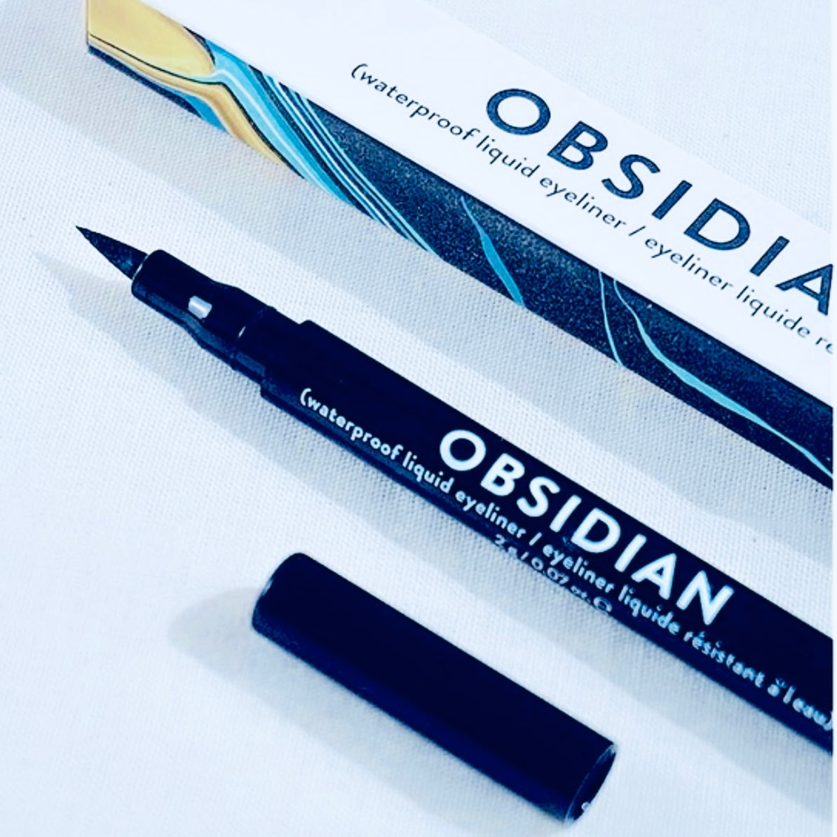 Calling all eyeliner aficionados! If you’ve ever had streaky liners that crease, melt, and run on you, you can put those beauty woes behind you. This liner is impressively waterproof and smudgeproof and delivers the blackest of black pigment. The Obsidian Waterproof Liquid Eyeliner offers a reliable and well-pigmented finish that lasts for up to 18 hours with minimal reapplication needed, making it the perfect choice for any occasion.