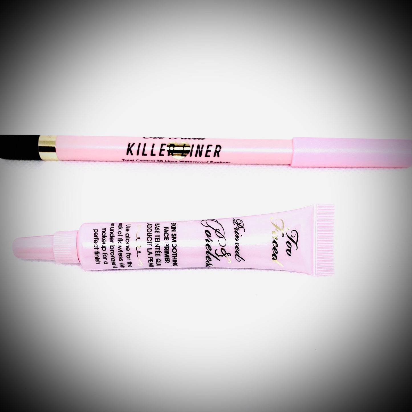 Toofaced Killer Liner In Black and TooFaced Primed & Poreless Makeup Primer. This bundle comes as a set and is available at Facetreasures.com for purchase