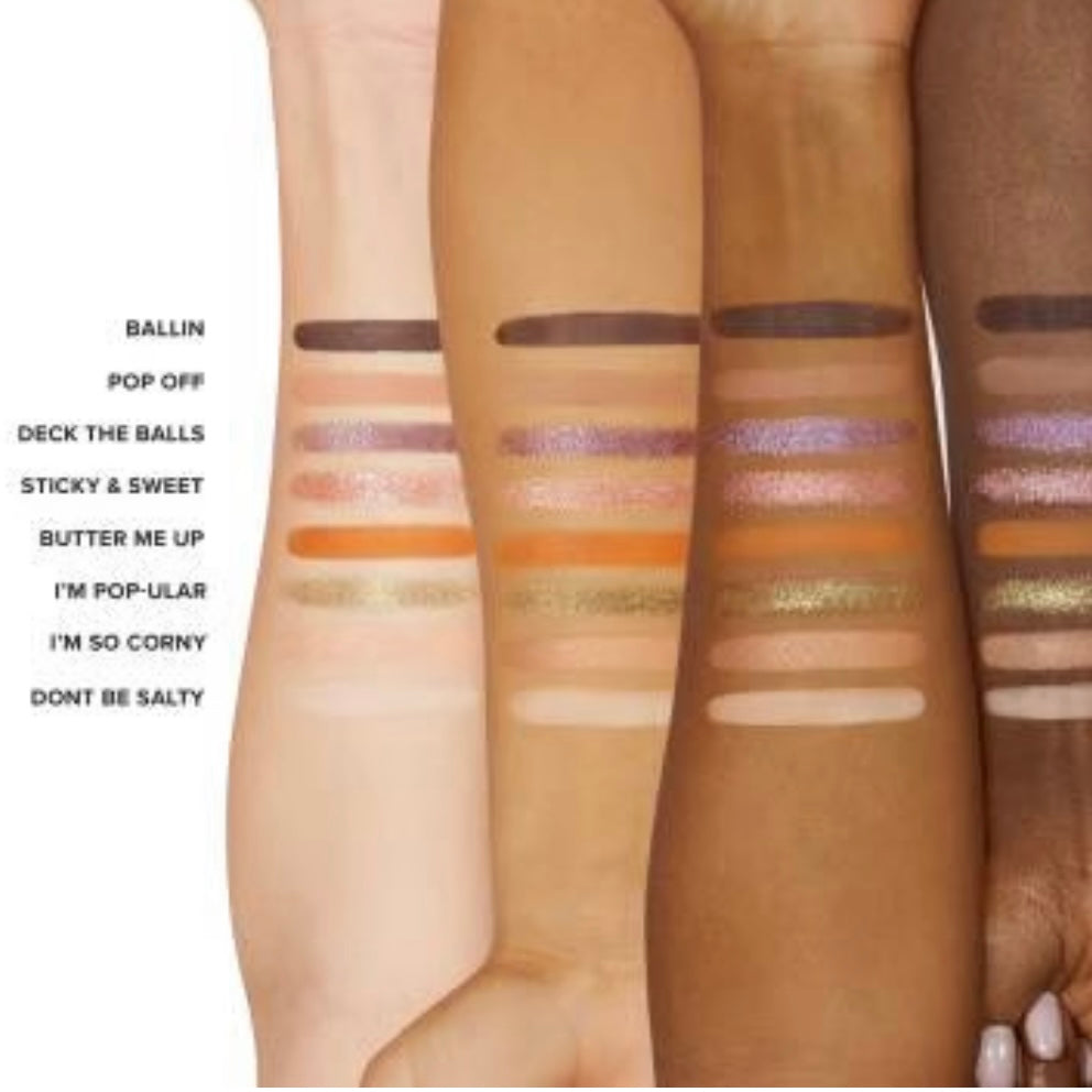 4 different color arms with 8 colors of the too faced limited edition popcorn balls shadow