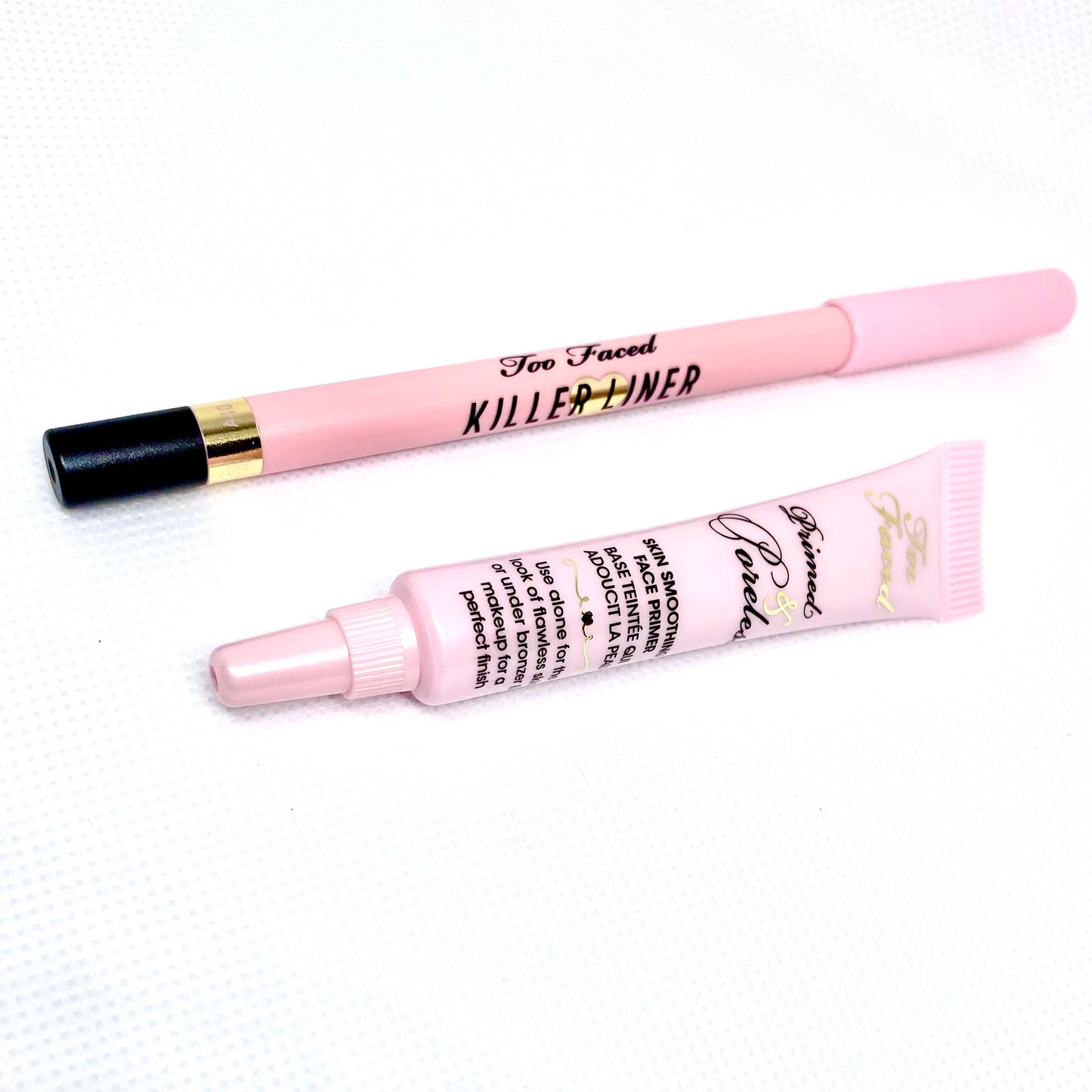 Toofaced Killer Liner In Black and TooFaced Primed & Poreless Makeup Primer. This bundle comes as a set and is available at Facetreasures.com for purchase