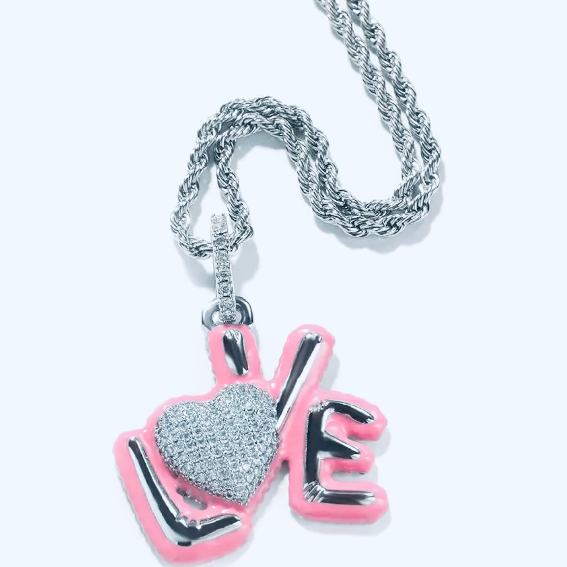 love pendant in the color pink, blue, silver or silver chrome with a matching diamond chain or silver or gold rope chain available only at Facetreasures.com