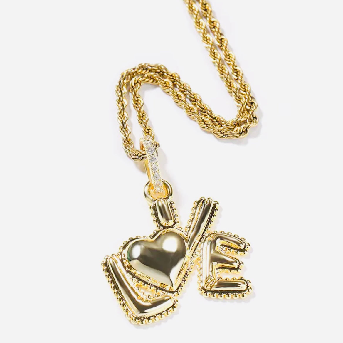 love pendant in the color pink, blue, silver or silver chrome with a matching diamond chain or silver or gold rope chain available only at Facetreasures.com
