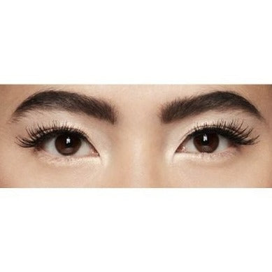 Mac Cosmetics False Eyelash Set With The Model Wearing Charmer Lash