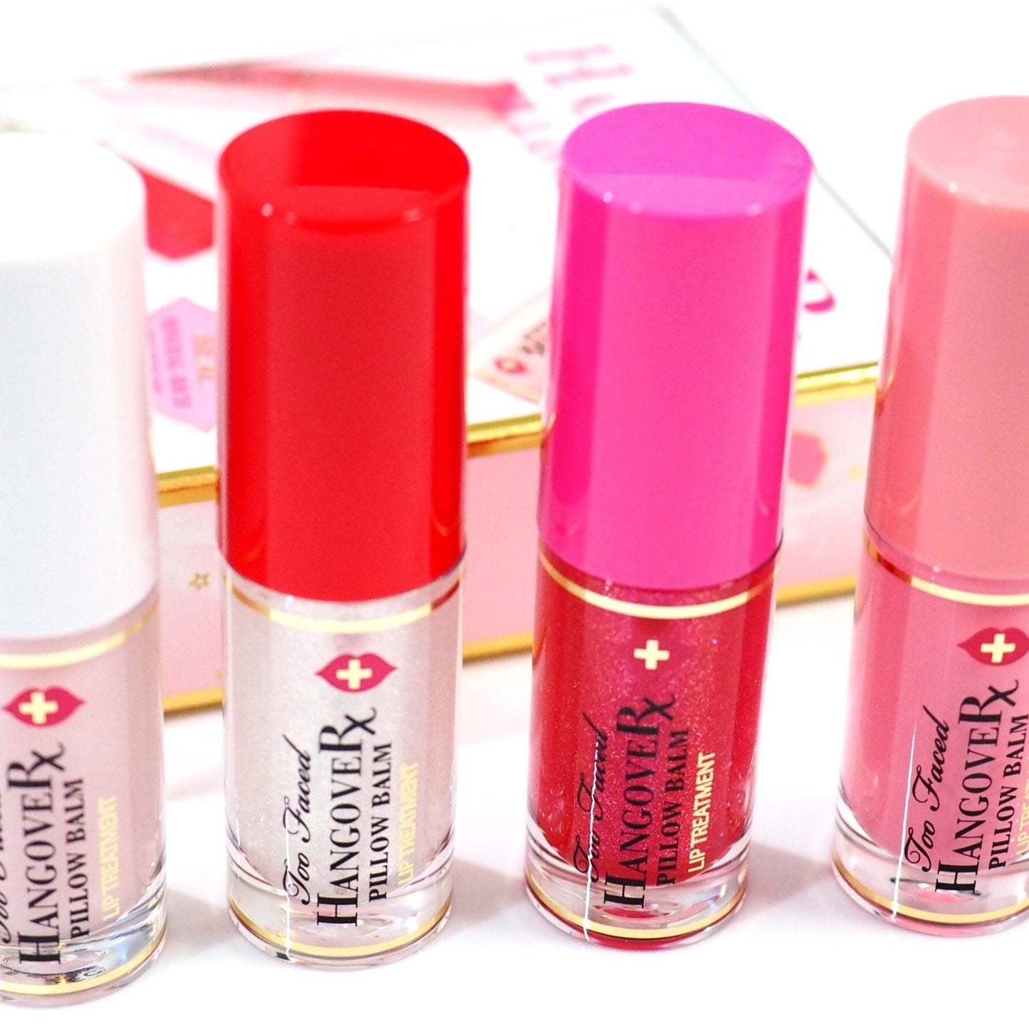 The Too Faced Hangover RX Pillow Balm Ultra-Hydrating and Nourishing Lip Treatment Set hydrates and replenishes your pout with 4 Super size deluxe size exclusive shades and scents that will take you into the holidays and beyond year around.