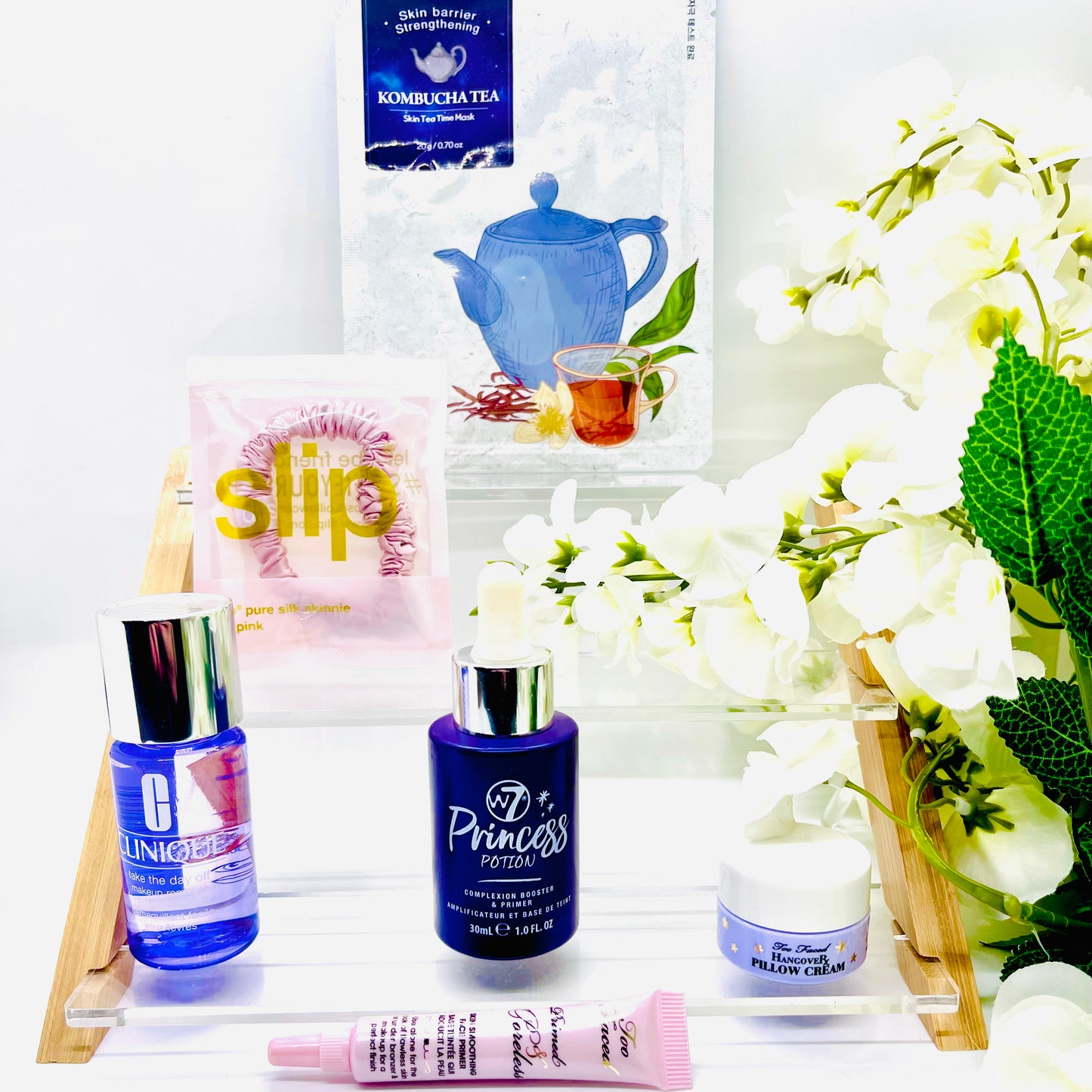FaceTreasures 7 piece Anti aging glow bundle w/ Free Bag, Shipped Today, bundle includes items from brands such as w7, Clinique, Estée Lauder, slip,Too Faced Cosmetics and premium K-beauty brand. This curated bundle is limited and only available at FaceTreasures Boutique