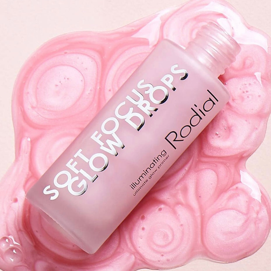 Soft focus glow drops by Rodial spilling out on a table