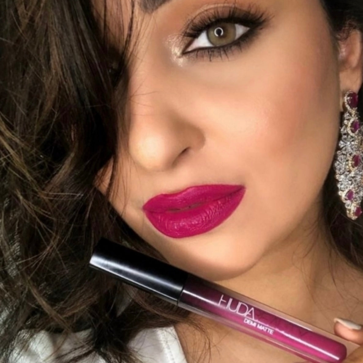 Inspired by Huda’s love for self-expression through makeup, Huda Beauty Demi Matte is a bold Cream Lipstick in the color “Passionista,” This beautiful lipstick is showcasing a full spectrum of an ultra-feminine color to complement every one of your alter egos. Saturated in pigment, the creamy texture glides on with an intense color release from the first swipe, creating a lacquer-like sheen which highlights and enhances the natural contours of your pout. Only available at FaceTreasures.Com