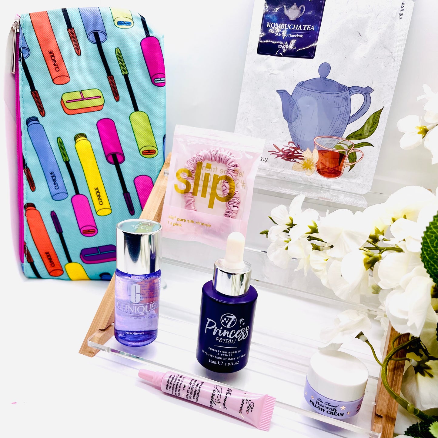 FaceTreasures 7 piece Anti aging glow bundle w/ Free Bag, Shipped Today, bundle includes items from brands such as w7, Clinique, Estée Lauder, slip,Too Faced Cosmetics and premium K-beauty brand. This curated bundle is limited and only available at FaceTreasures Boutique