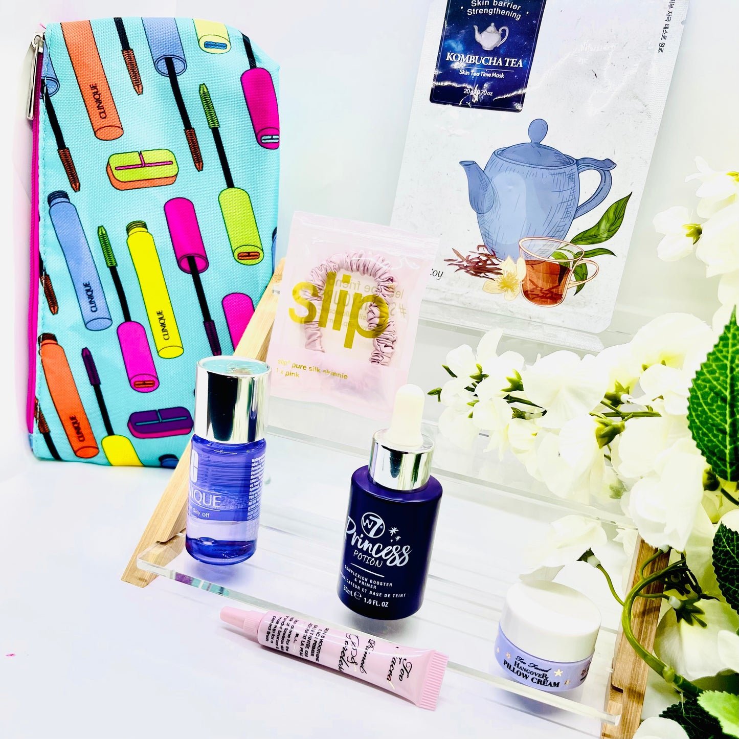 FaceTreasures 7 piece Anti aging glow bundle w/ Free Bag, Shipped Today, bundle includes items from brands such as w7, Clinique, Estée Lauder, slip,Too Faced Cosmetics and premium K-beauty brand. This curated bundle is limited and only available at FaceTreasures Boutique