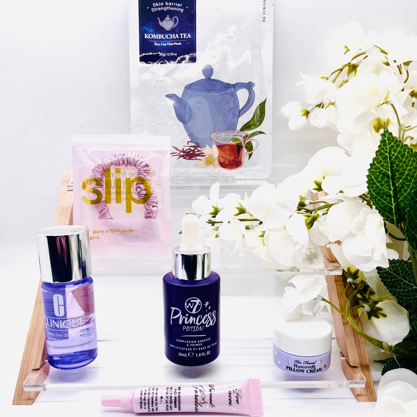 FaceTreasures 7 piece Anti aging glow bundle w/ Free Bag, Shipped Today, bundle includes items from brands such as w7, Clinique, Estée Lauder, slip,Too Faced Cosmetics and premium K-beauty brand. This curated bundle is limited and only available at FaceTreasures Boutique