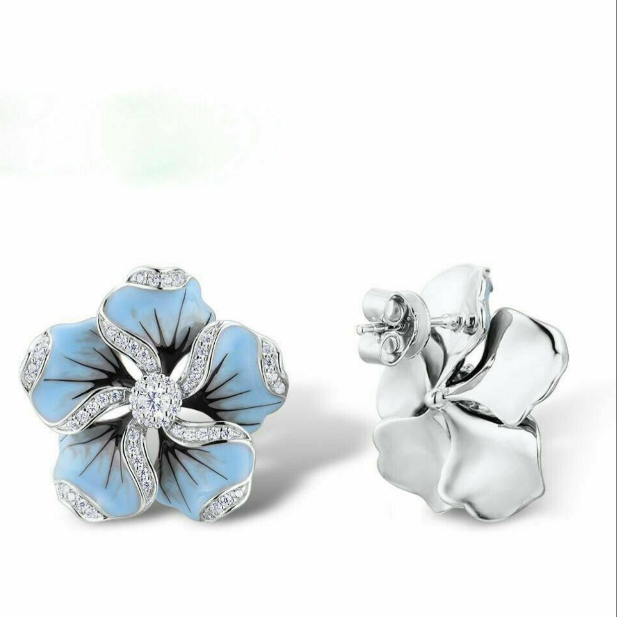 Preciosos pendientes de flores con incrustaciones de zafiro azul pastel de plata 925