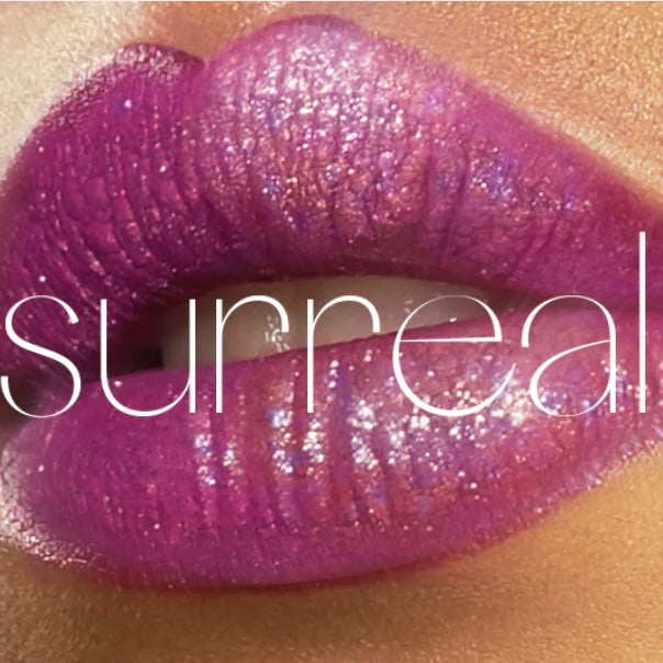 Model is showcasing the glitter flip liquid lipstick by Ciate London Cosmetic’s in the color “Surreal”