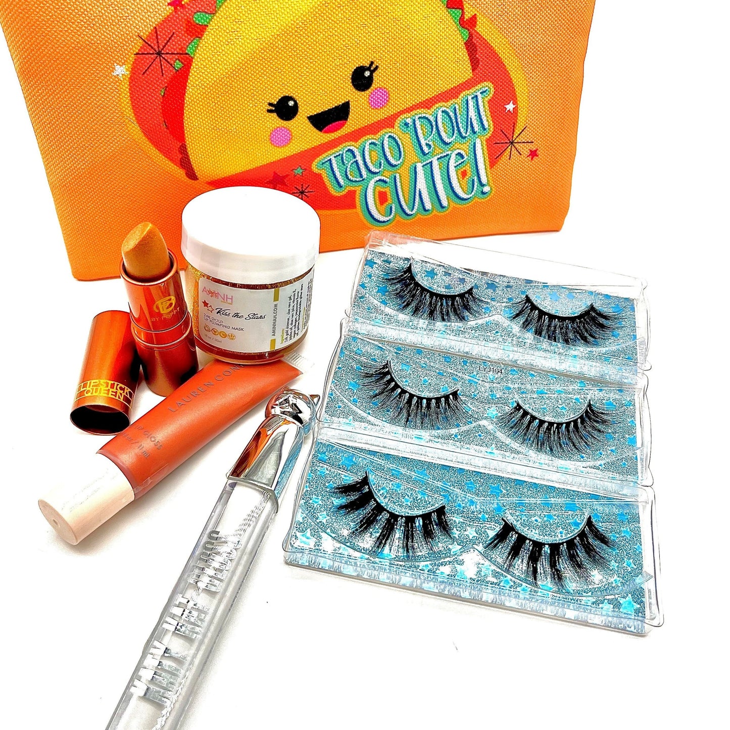 Lips & Lashes Gift Set Includes 3 Vegan Wispy 22mm Siberian Eyelashes, One Katy Kat Lip Gloss By Katy Perry, One Lipstick Queen Lipstick In Queen Bee, One Premium Lip Scrub (Brand Will Vary) One Free Beauty Bag To Carry All The Essentials.