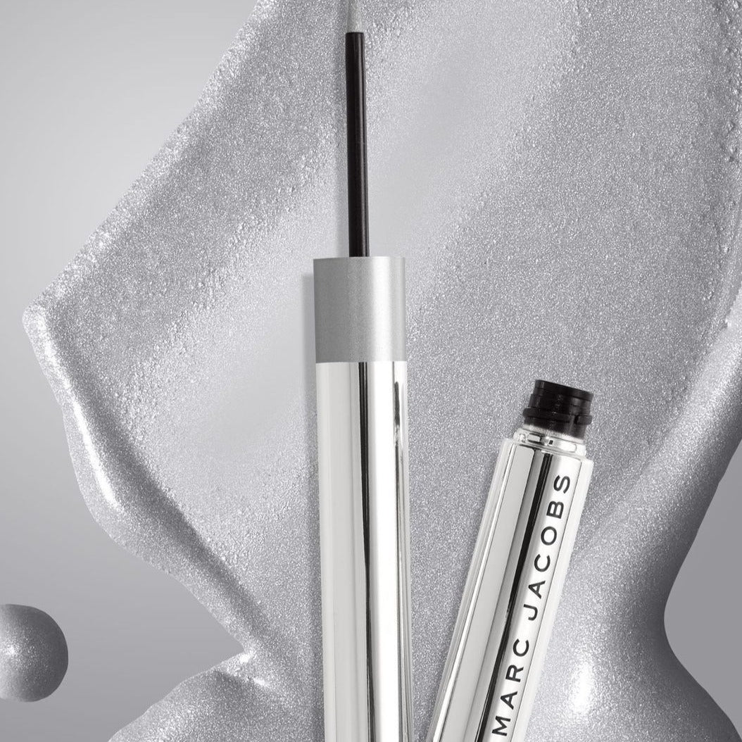 A waterproof, liquid-gel eyeliner with extreme longwear, shiny color, available in Marc's Jacobs signature Silver Lining and eye-catching metallic shade finishes. Dress up your cat eye with extreme longwear, shiny pigment that lasts. Meet the new liquid-gel eyeliner, inspired by the cult-favorite Highliner Gel Eye Crayon. Stand out among them all and give your eyes and instant pop of color.