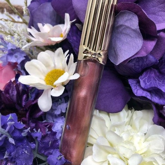 Gloss to make em envy, All natural lip plumping gloss that gives result immediately & With a Estee Lauder pure color envy #115 flashfire -Shine so bright, you can't help but kiss it.