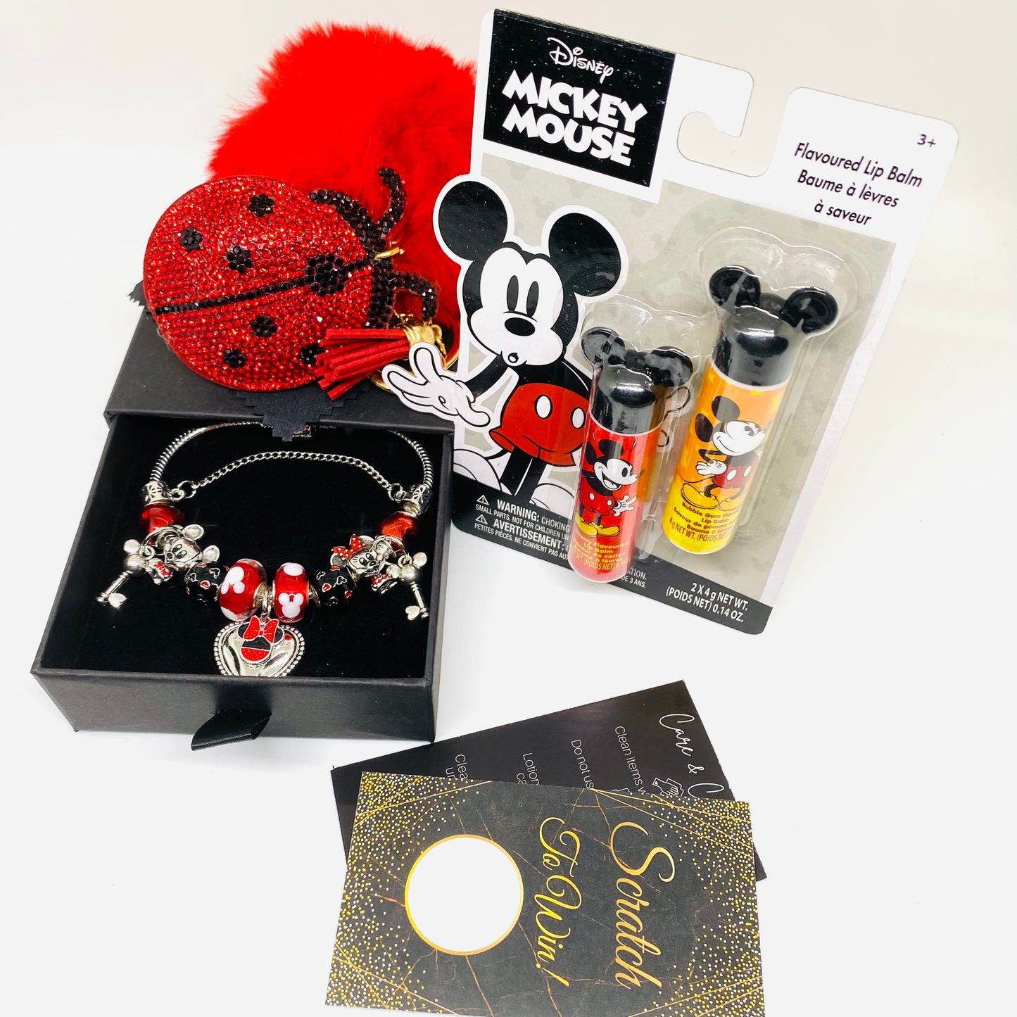 2024 Disney & Friends Vintage Mickey Mouse Silver Charm Bracelet Bundle Includes a matching Duo Disney Chapstick Bundle In The Flavor Bubble Gum & Cherry & One Red and Black sequence Lady Bug Sparkly Gold Keychain With fur Ball Attachment.