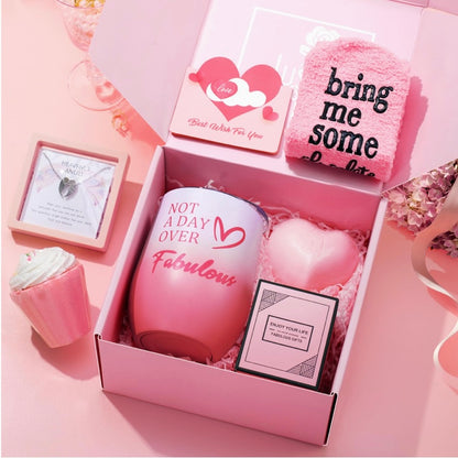 Dive into a world of luxury with our Fabulous Indulgence Gift Set. Specially curated for Valentine’s Day, this set includes a plush ‘Bring Me Some Chocolate’ sock, a heart-shaped handcrafted soap, an elegant tumbler inscribed with ‘Not A Day Over Fabulous’, a cupcake-shaped bath bubble bomb with sprinkles on top and last but definitely not least, to the best part of this luxury gift set which pays for the entire box two times over, You are also getting a 100% 925. Sterling Silver Diamond Cut Angel