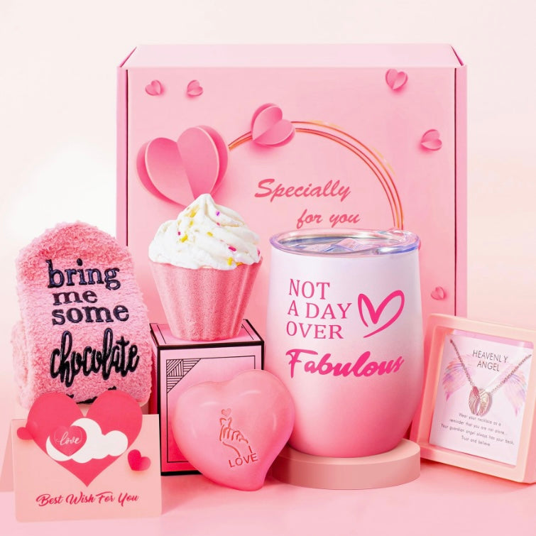 Dive into a world of luxury with our Fabulous Indulgence Gift Set. Specially curated for Valentine’s Day, this set includes a plush ‘Bring Me Some Chocolate’ sock, a heart-shaped handcrafted soap, an elegant tumbler inscribed with ‘Not A Day Over Fabulous’, a cupcake-shaped bath bubble bomb with sprinkles on top and last but definitely not least, to the best part of this luxury gift set which pays for the entire box two times over, You are also getting a 100% 925. Sterling Silver Diamond Cut Angel