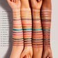 This photo is showing 4 different color of arm shades such as a white arm,  tan arm, olive complexion Arm and a dark skin arm, all four arms are showing 16 different eyeshadow color swatches from the premium Fenty beauty Moroccan eyeshadow palette.￼