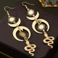 Gold Celestial Snake Dangle Earrings – Mystical Moon & Star Jewelry for Bold Style