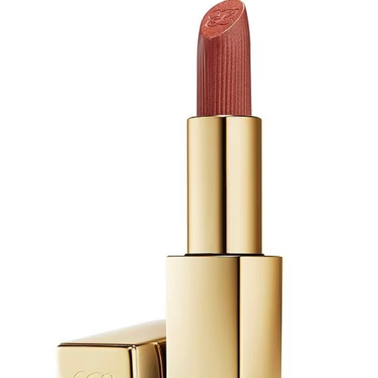 Estée Lauder Pure color Envy Limited Edition Lip sculpting lipstick in the color #111 Tiger Eye, lipstick is shown in a gold,  chrome case ￼