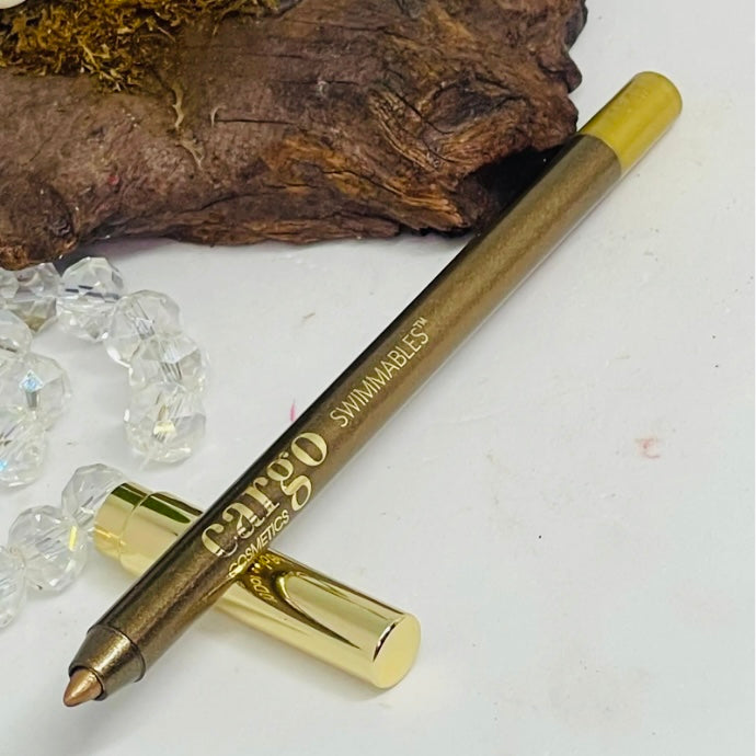 Cargo cosmetics “Swimmables” Waterproof Bronze Eye Crayon/eyeliner Pencil in the color “Dorado Beach #10 
Currently only available for purchase at Facetreasures.com
