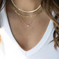 Layered Gold Necklaces: 3-Piece 14K Vermeil Gold over solid 925. Silver necklace set for Women, this set includes one 16 inch clavicle herringbone 14 karat vermeil gold necklace, one 17 inch paperclip style 14 karat Vermeil gold & one 18inch necklace with a 1 carat total weight of flawless princess cut cubic zirconia pendant. All 3 are beautiful worn as a layered style or can be worn separately. Only available for purchase at Facetreasures.com