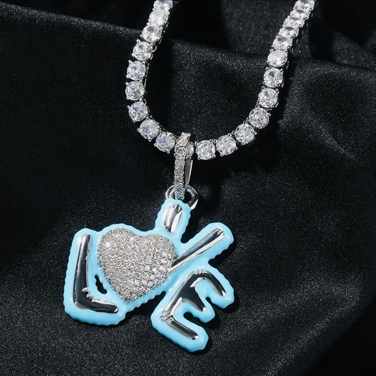 love pendant in the color pink, blue, silver or silver chrome with a matching diamond chain or silver or gold rope chain available only at Facetreasures.com