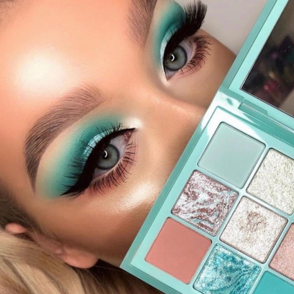 Huda Beauty’s Mint Obsessions Palette is here – and it’s a vision of pale pistachio, diamond-like silver and vivid aquamarine.  A dream come true, this palette unites a spectrum of nine pigment-packed powders – four vibrant duo-chrome shimmers and five creamy mattes – in shades of cool brown to mint green and desert sand. only available at Facetreasures.com