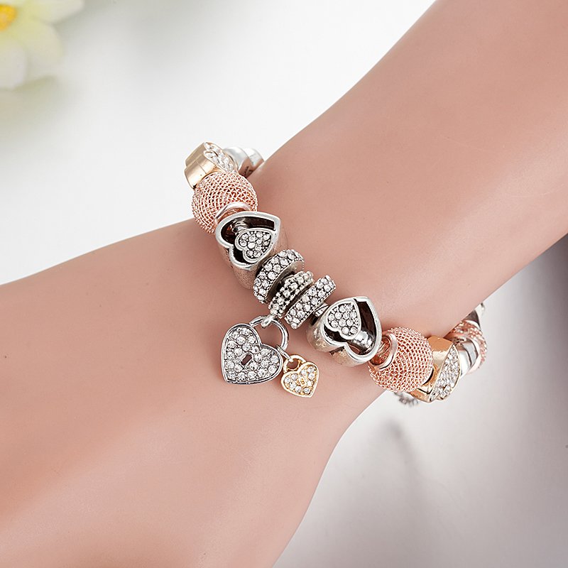 Beautiful Silver & Rose Gold Heart Charm Bracelet